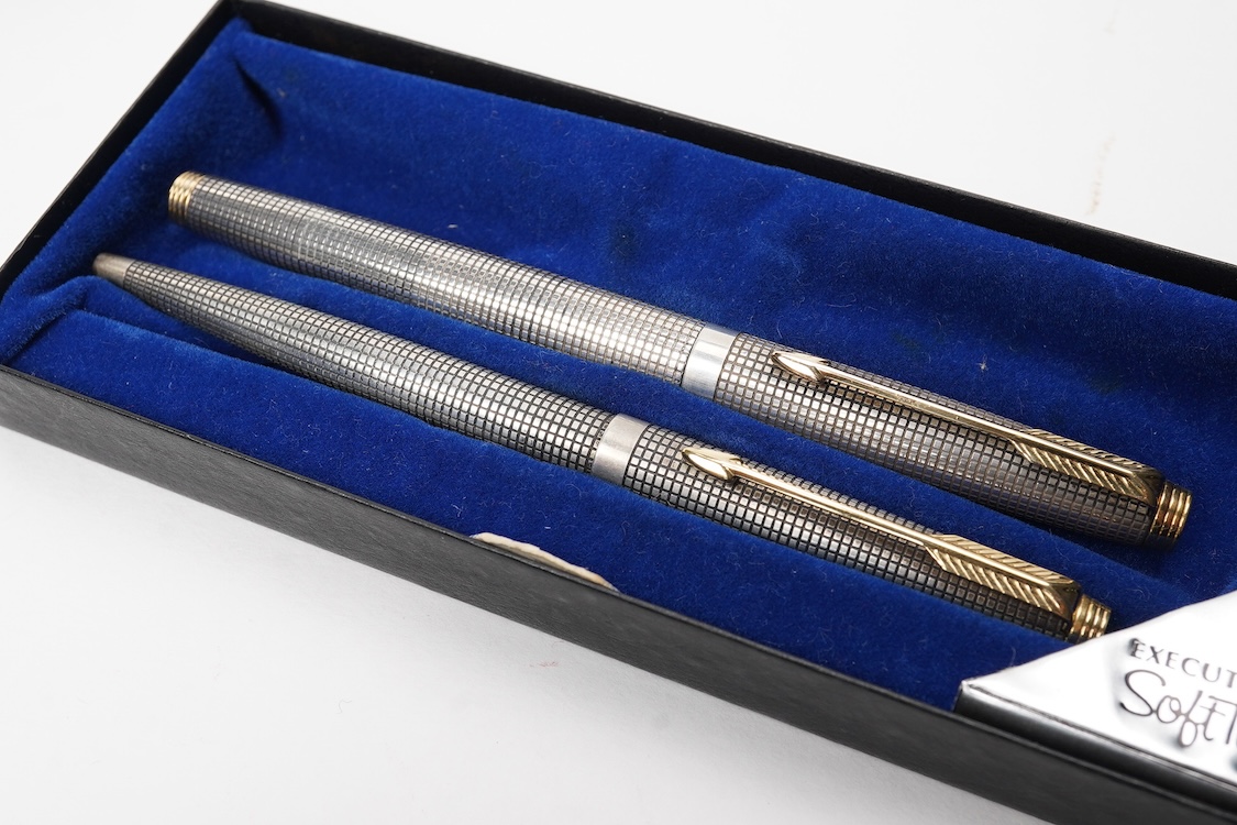 A Parker Sterling silver Cisele fountain pen and matching ballpen in original box along with a collector's pen case